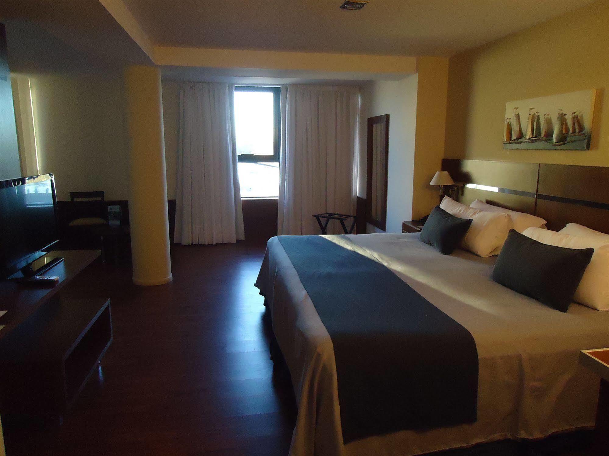 Puerto Amarras Hotel & Suites Санта-Фе Экстерьер фото
